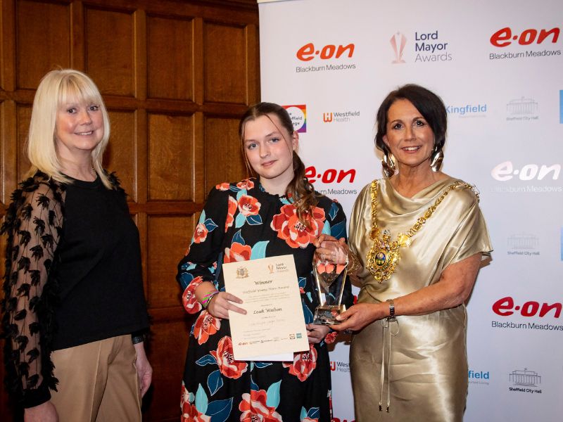 Leah Walton being presented an award