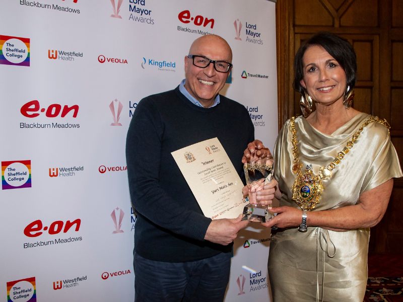 Yuri Matischen being presented an award